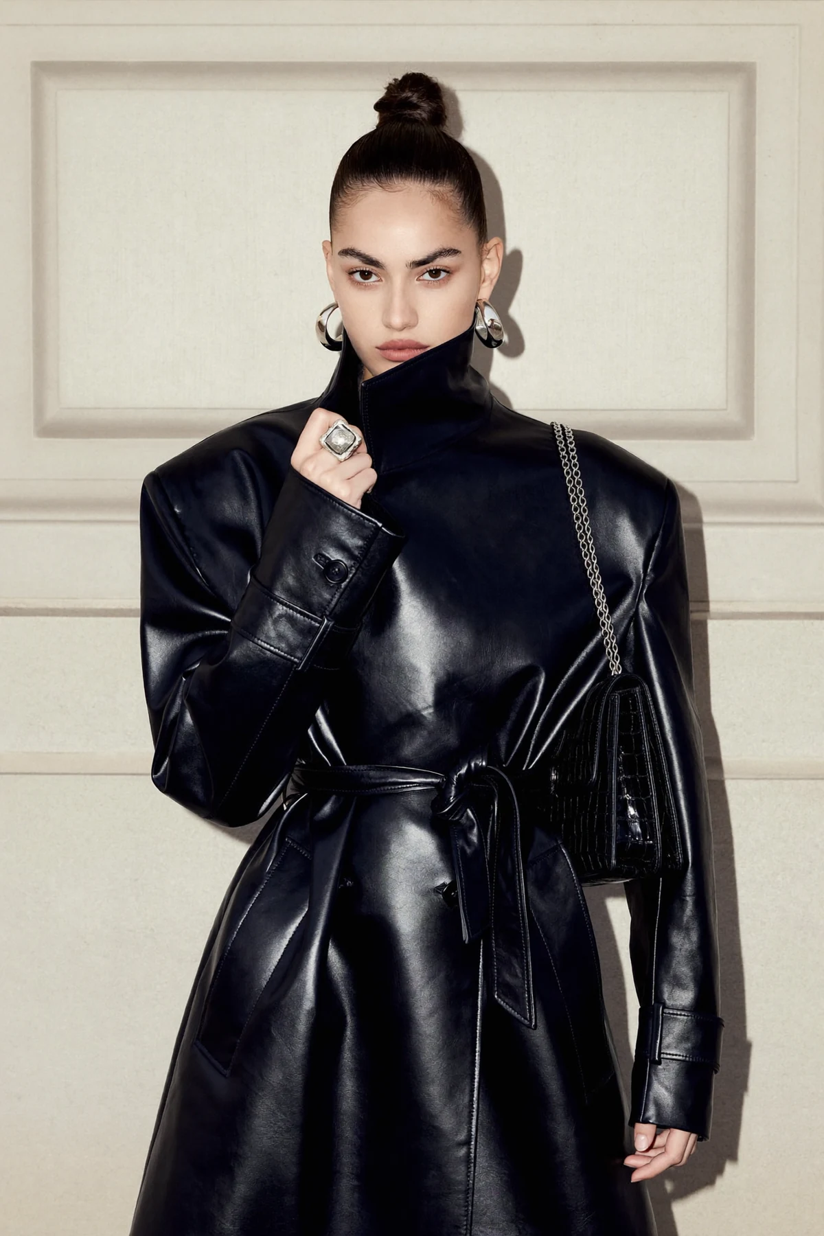 Sculptural black leather fashion look